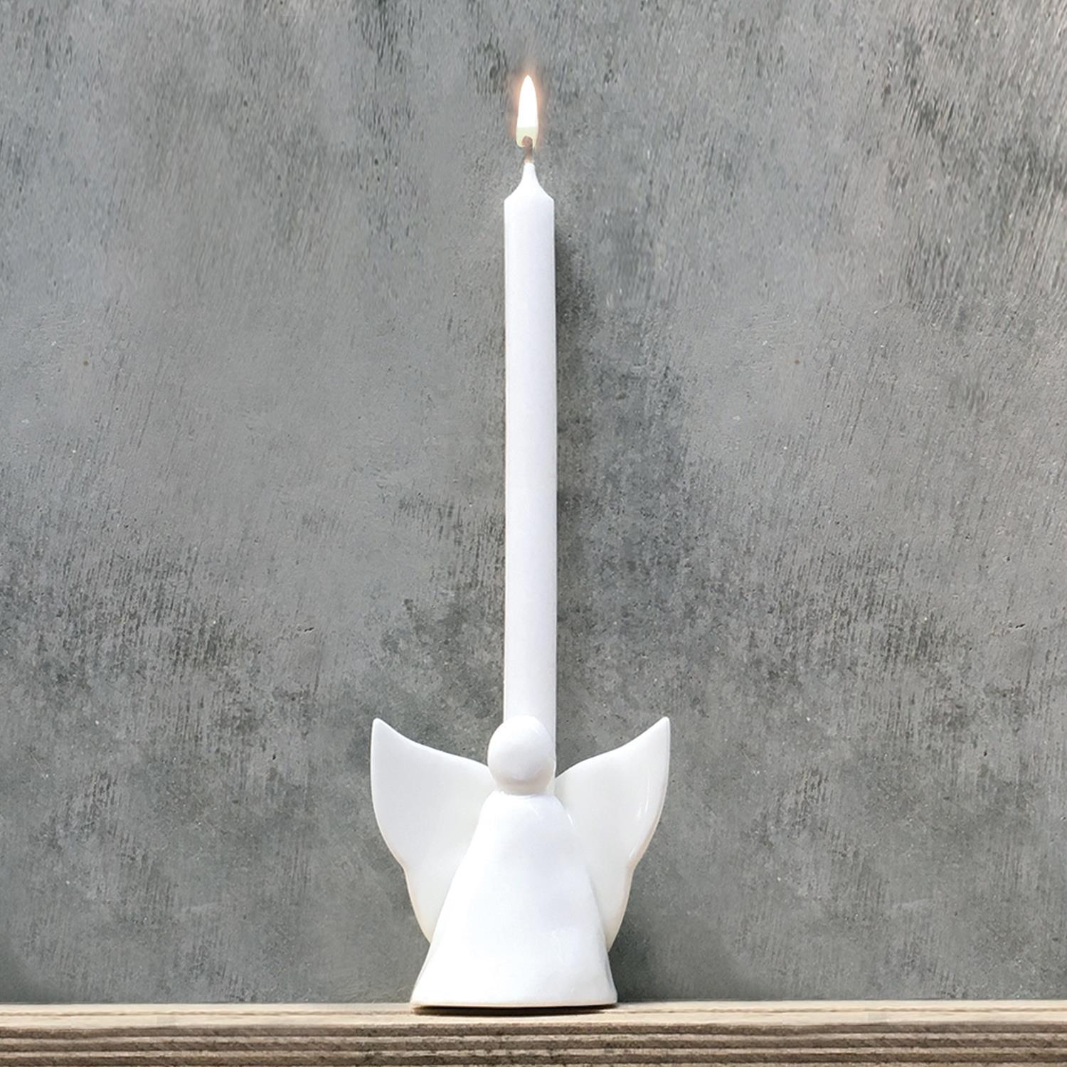 The Angel Decorative Sculpture/Vase/Candleholder features a graceful angel with spread wings, holding a white candle. Available in one size.