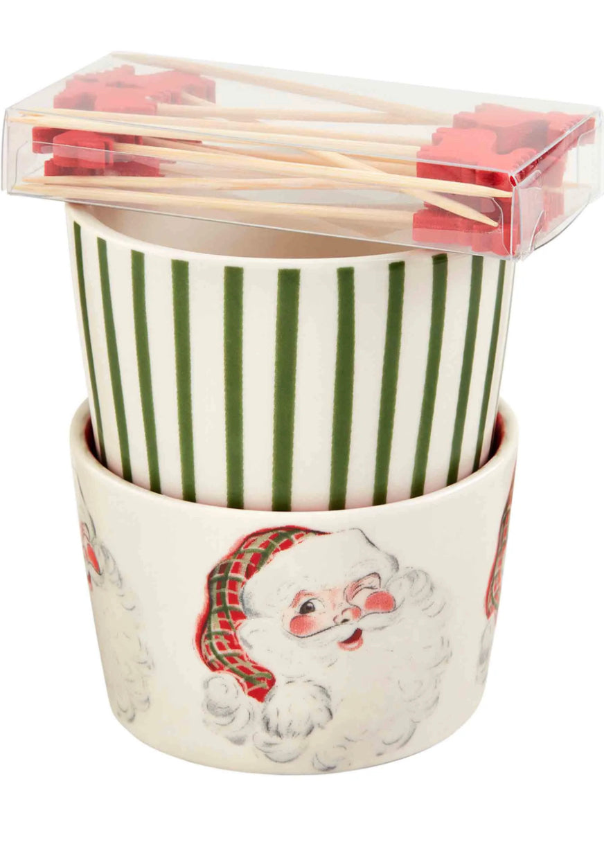 Vintage Christmas Tidbit Set with two nested ramekins, one with green stripes and one with a winking Santa pattern.