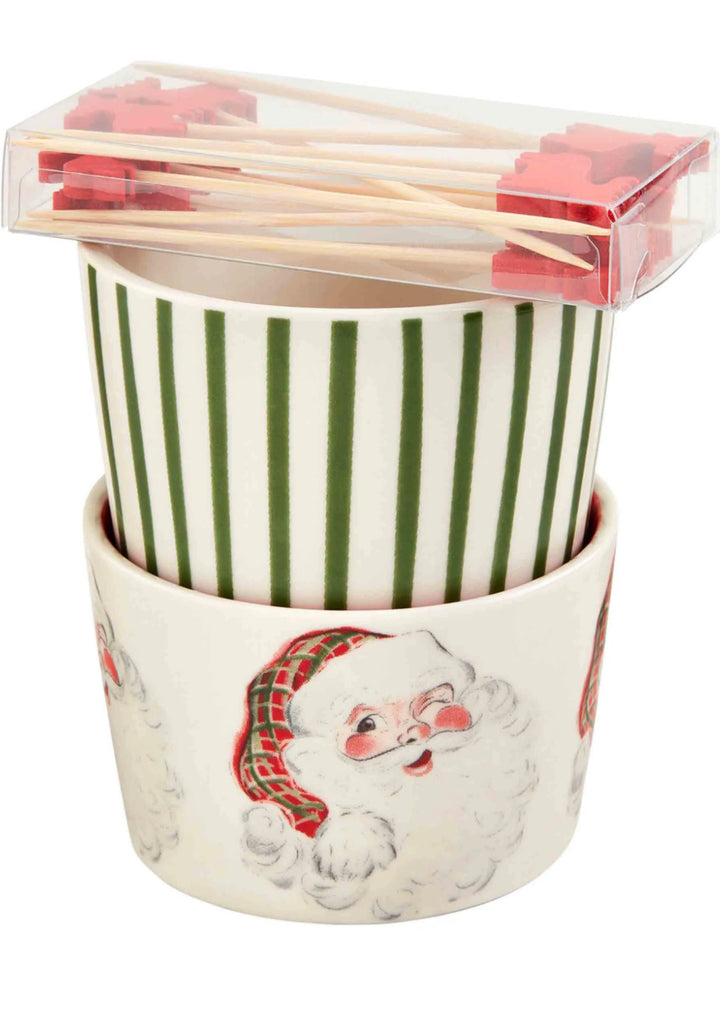 Vintage Christmas Tidbit Set with two nested ramekins, one with green stripes and one with a winking Santa pattern.