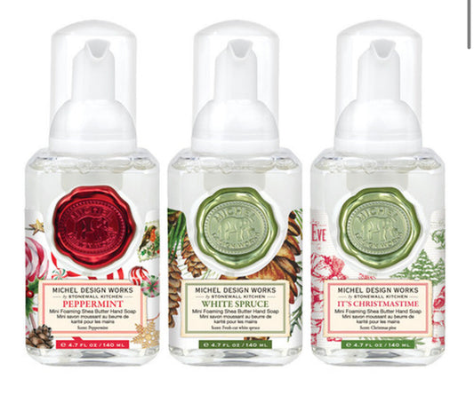 Three mini foaming hand soaps: Peppermint, White Spruce, and It's Christmastime. Festive holiday labels. Sizes: Mini.