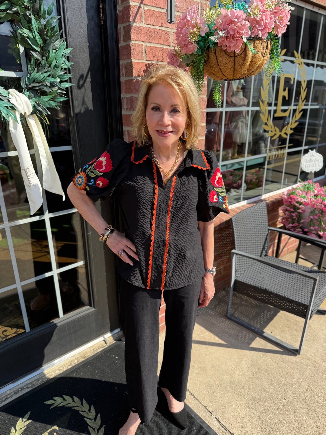 Fall in Bloom Blouse with colorful sleeves; available in sizes XS–XL.