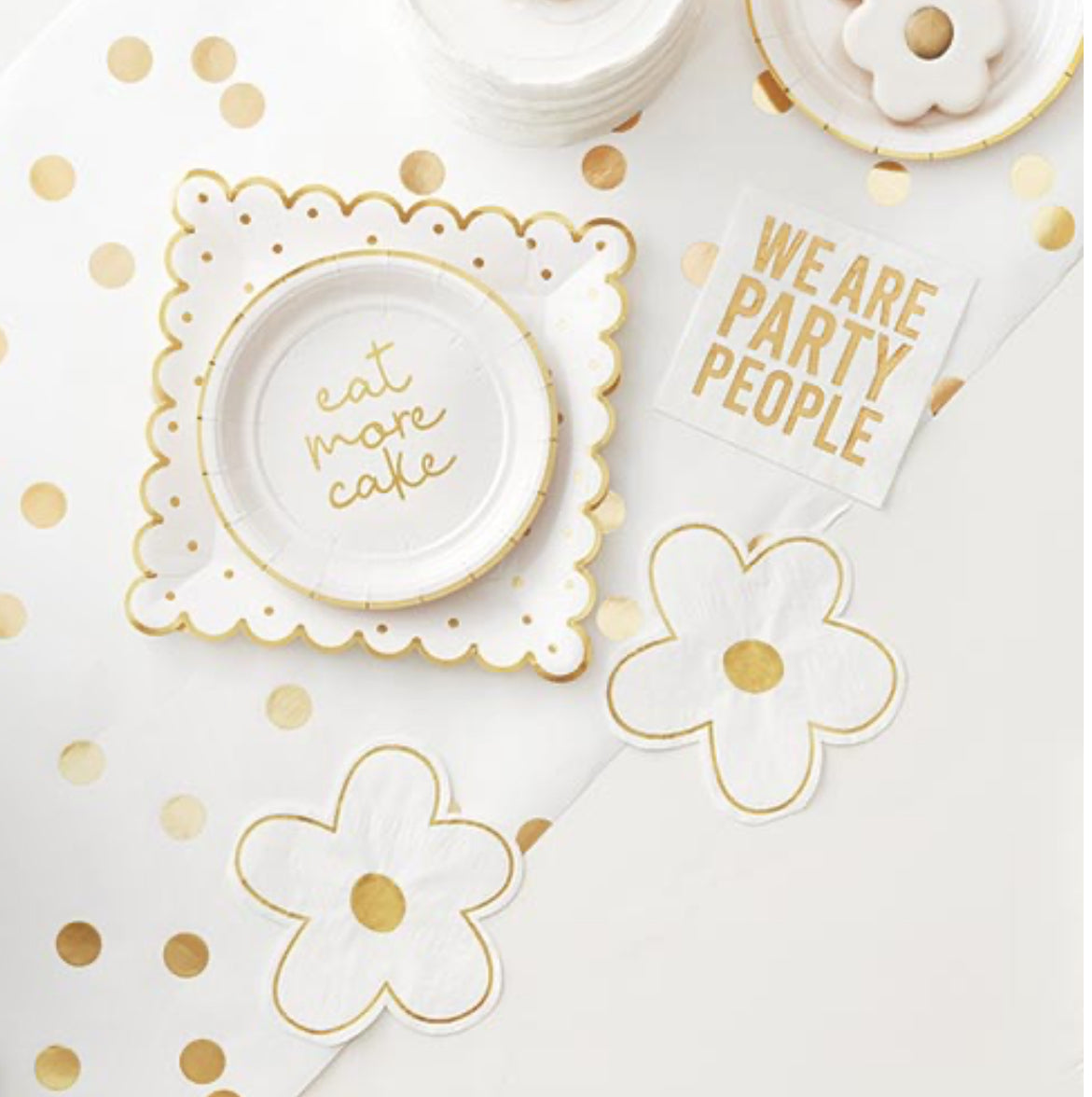 Square paper plates with scalloped edges saying "Eat More Cake," napkins stating "WE ARE PARTY PEOPLE," and flower-shaped coasters. Available sizes: Standard party size.