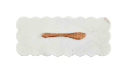Rectangular scalloped marble board with elegant edges and mango wood spreader. Sizes available: not specified.