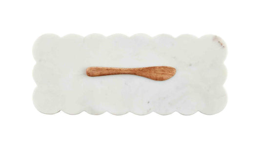 Rectangular scalloped marble board with elegant edges and mango wood spreader. Sizes available: not specified.