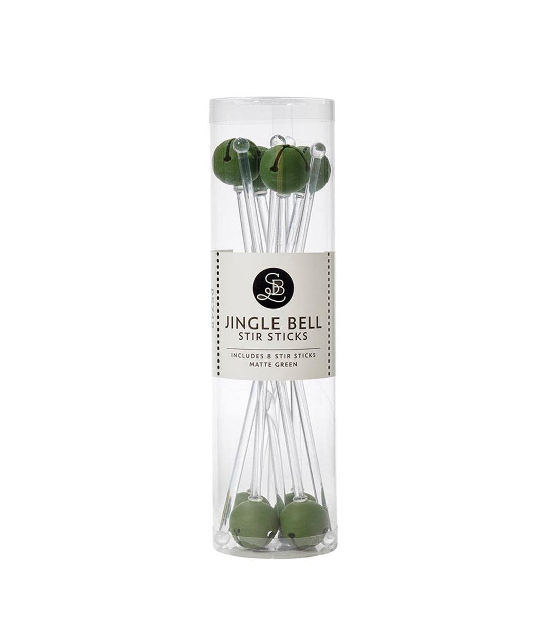 Eight clear holiday cocktail stir sticks with matte green jingle bells in a clear plastic tube.