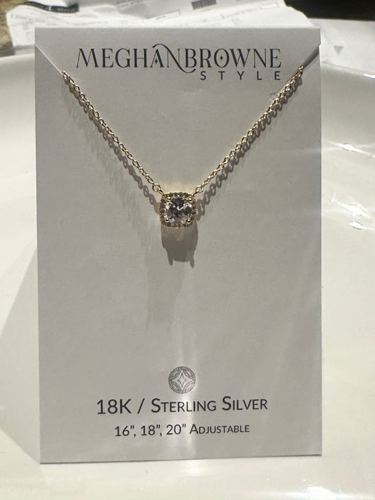 Gold chain necklace with round cubic zirconia pendant; adjustable to 16", 18", or 20".
