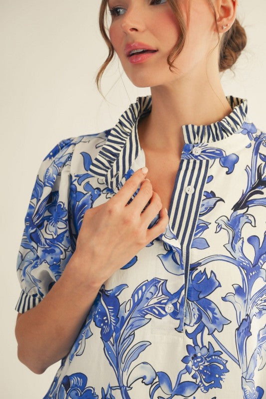 Royal Blue Floral Dress with blue floral pattern, striped collar and cuffs. Sizes: XS–XL.
