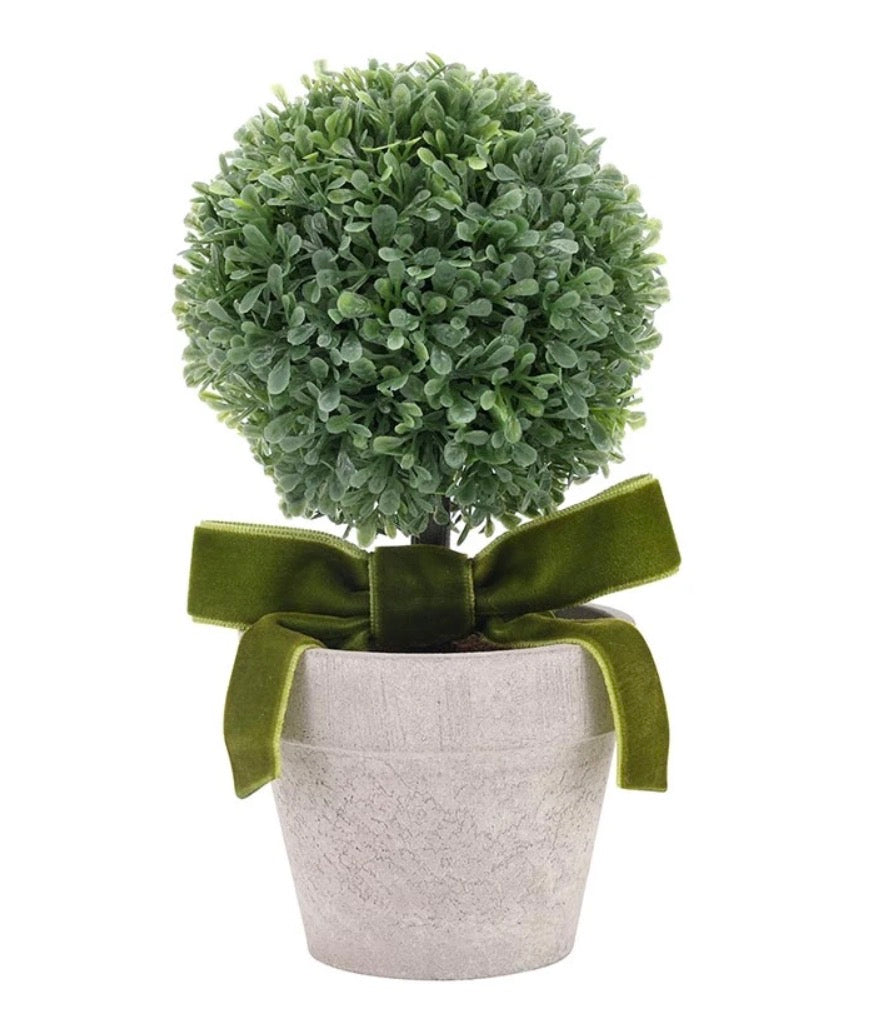 Small, round faux topiary in a gray pot with a green velvet bow; available in multiple sizes.