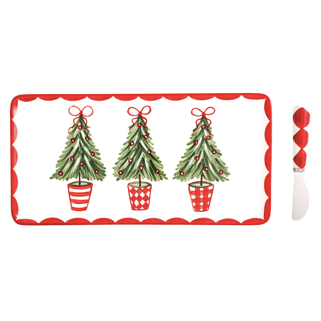 Holly Tray and Spreader: hand-painted rectangular ceramic tray with three illustrated Christmas trees and metal spreader with red and white geometric handle.