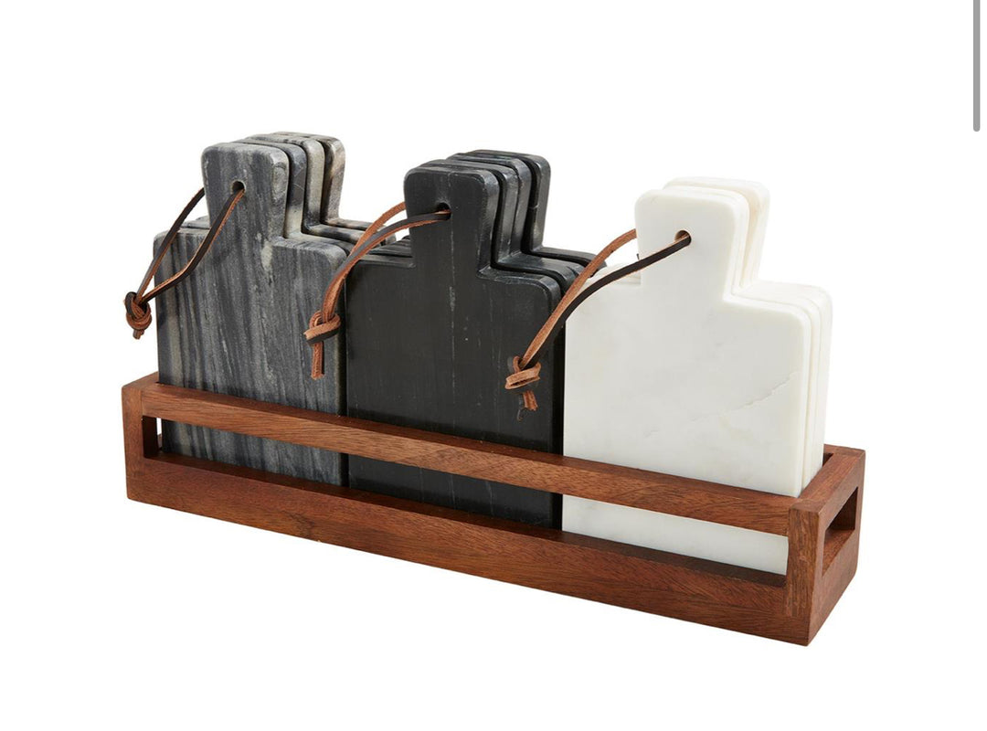 Mini marble paddle boards in gray, black, and white with leather straps; available in small size.