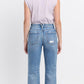 Periwinkle High Rise Frayed Hem Straight Jeans with frayed hem. Available in sizes 24–32.