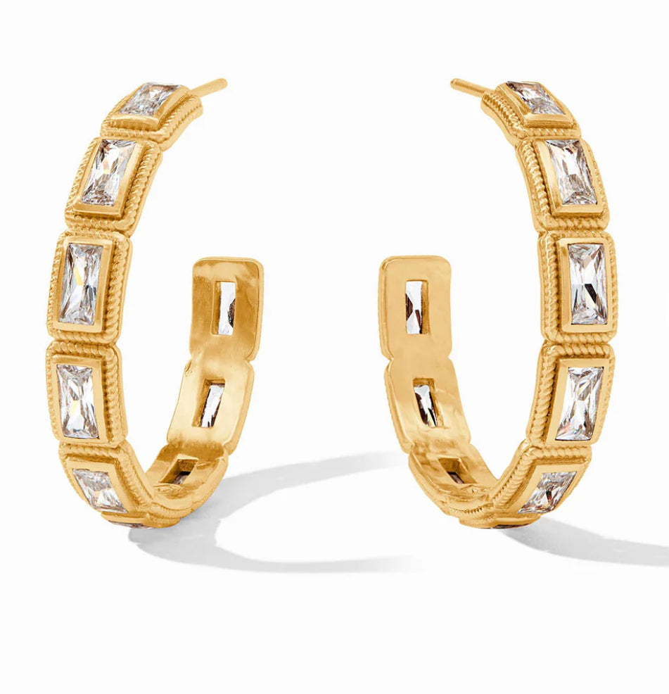 The Baguette Hoop - Medium earrings are 24K gold-plated with baguette-cut gemstones and a textured design. They have a hinged closure. Available sizes: Medium.