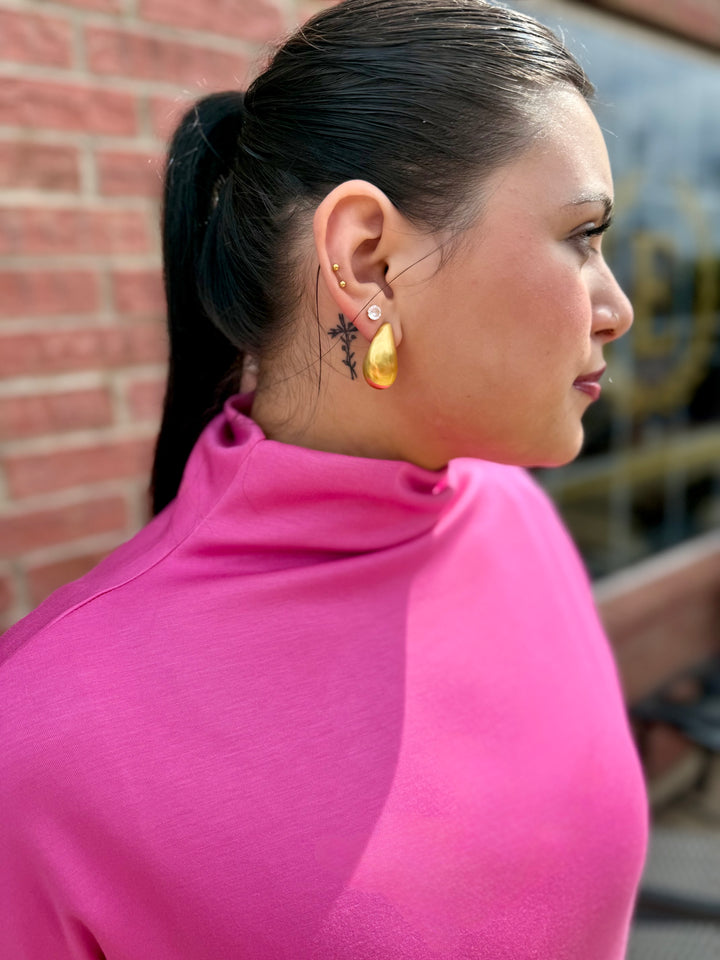 Pink Solid Mock Neck Pullover Dress with a sleek finish; available in sizes XS to XL.