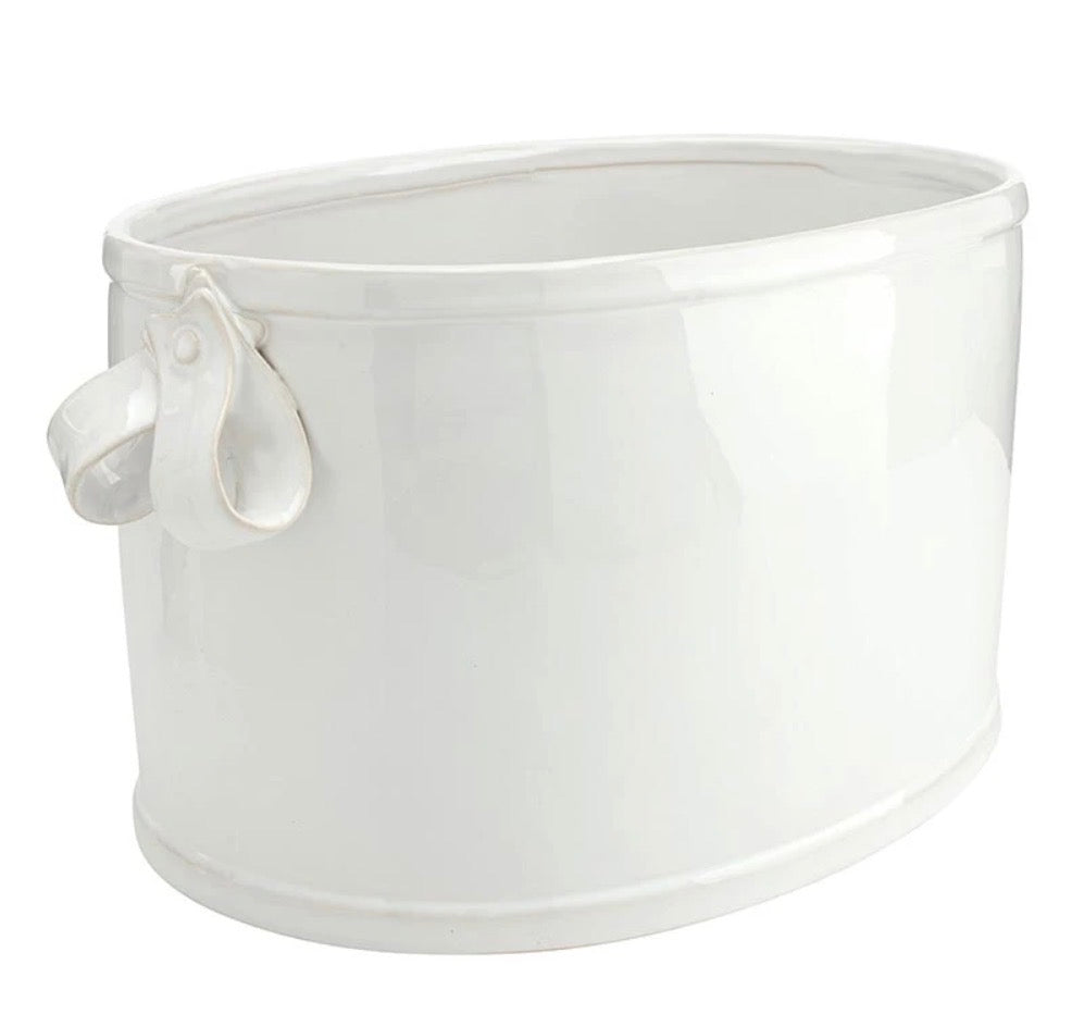 White oval ceramic bucket with glossy finish and small looped ribbon-style handle on one side. Available in multiple sizes.