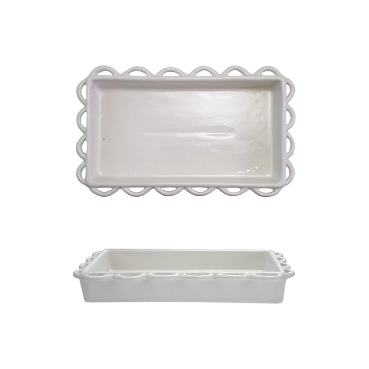 Rectangular white stoneware napkin holder with scalloped edge, shown from above and at an angle. Available in two sizes.