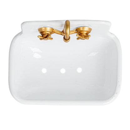 Metal sink soap dish, three drainage holes, two brass faucet handles on top; available in small and large sizes.