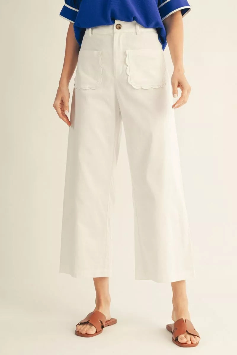Scalloped Pocket Off White Pants with unique scallop-pocket design, available in sizes XS–XL.