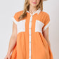 Burnt Orange/White Game Day Dress with white collar and pocket details. Sizes available: S, M, L, XL.