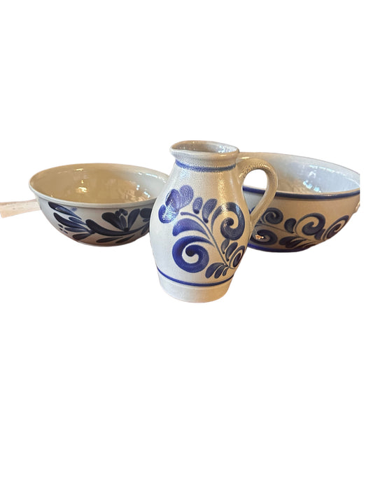 Salt Glazed German Pottery set: ceramic pitcher and two bowls, blue floral hand-painted design on white. Sizes: small/medium/large.