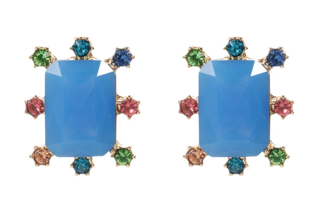 Rectangle Burst Stud Earrings featuring large blue rectangular stones surrounded by small round multicolored gems in green, blue, pink, and orange set in gold. Available sizes: small, medium, large.