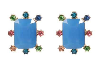 Rectangle Burst Stud Earrings featuring large blue rectangular stones surrounded by small round multicolored gems in green, blue, pink, and orange set in gold. Available sizes: small, medium, large.