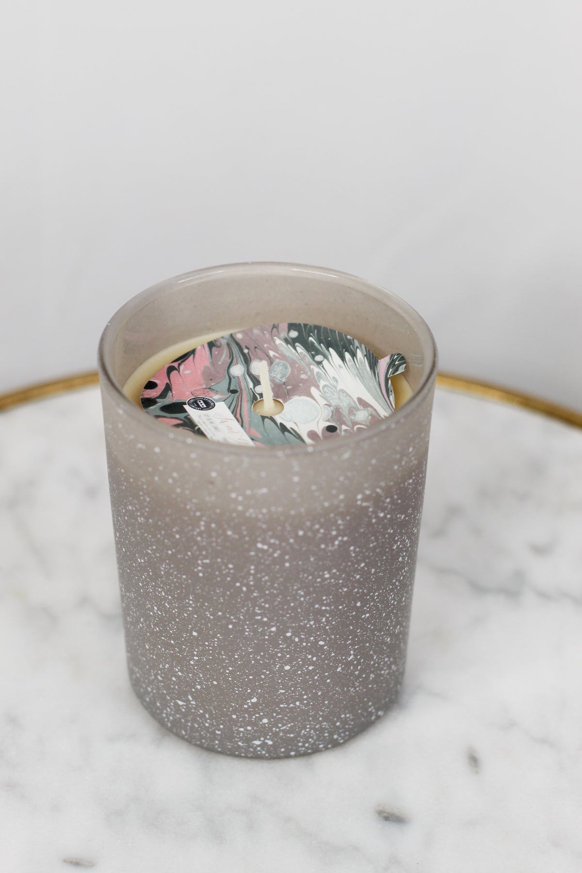 Sweet Grace Collection #045 candle in speckled frosted glass, marbled pink, black, white, and beige soy-blend wax. Sizes: S/M/L.