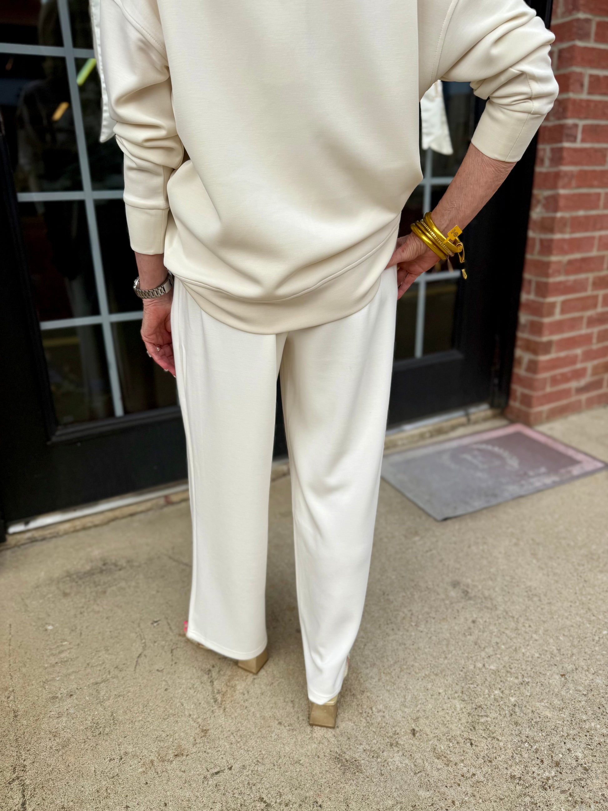 Loose-fitting Hazel Ivory Pants in CloudSilk fabric, available in sizes XS-XL.