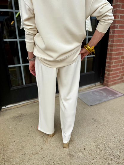 Loose-fitting Hazel Ivory Pants in CloudSilk fabric, available in sizes XS-XL.