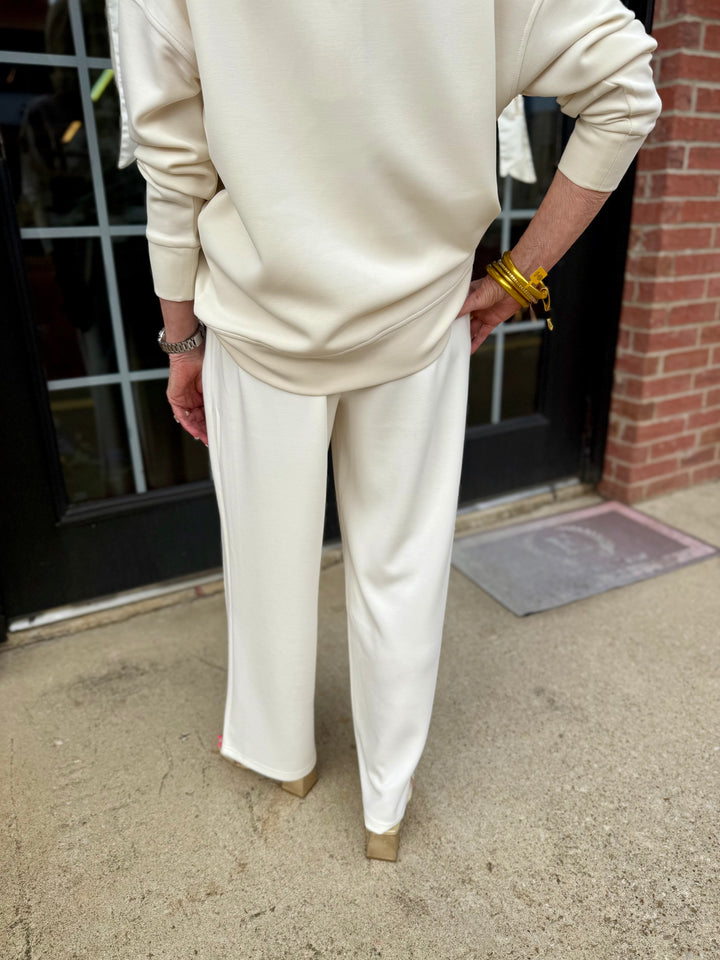 Loose-fitting Hazel Ivory Pants in CloudSilk fabric, available in sizes XS-XL.