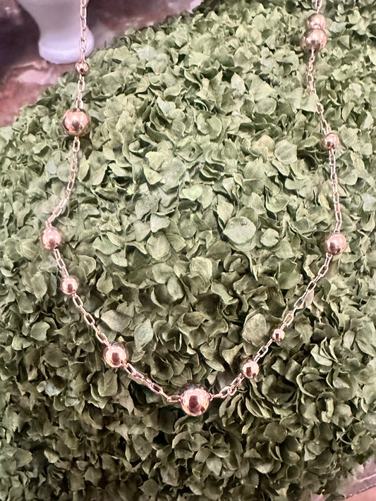 Water Resistant Gold Graduated Beaded Chain with graduated beads. Available in 16", 18", and 20" lengths.