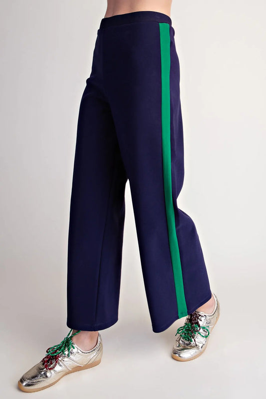 Everyday Pull-on Contrast Pants in navy with high waist, wide-leg silhouette, and green side stripe. Available in sizes XS–XL.