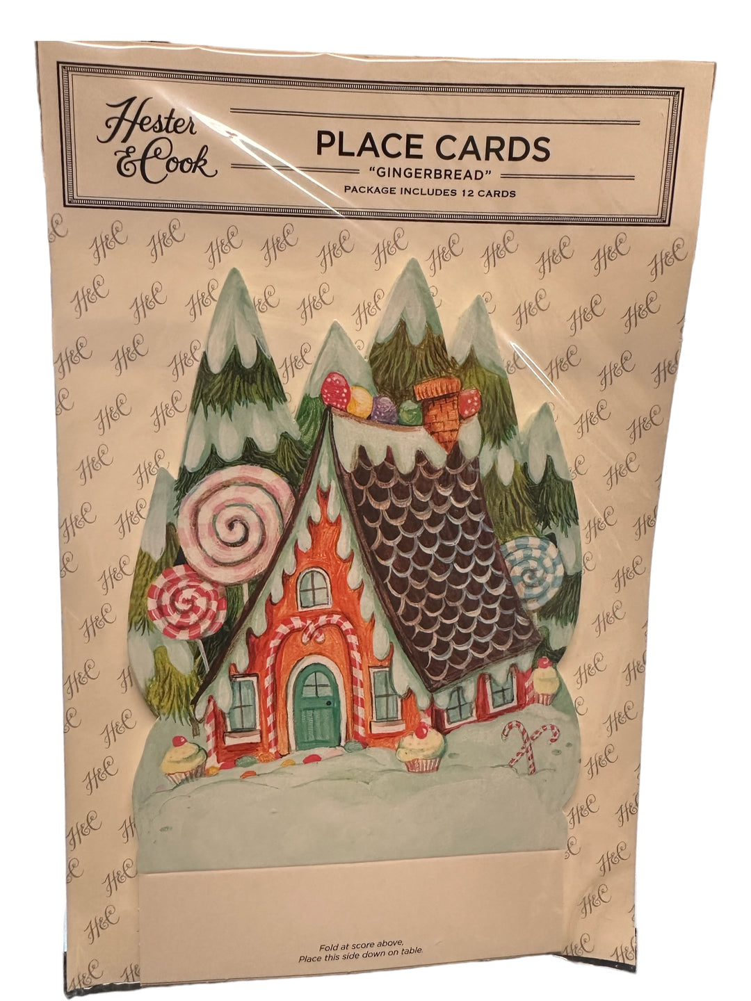 Twelve gingerbread house-shaped place cards.