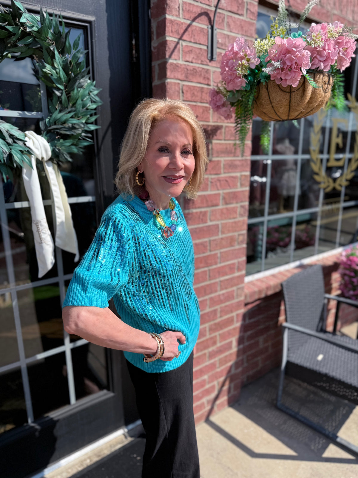 Rosalie Sequin Blouse in bright blue, available in sizes XS–XL.