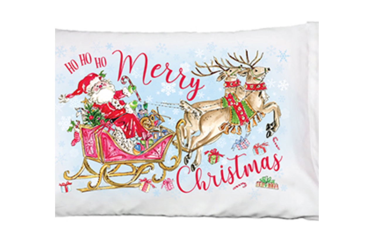 Ho Ho Ho Merry Christmas Santa on His Way Pillowcase: Festive scene with Santa in a red sleigh, pulled by two reindeer. Features "Ho Ho Ho Merry Christmas," snowflakes, candy canes, and decorations. Sizes available: Standard.