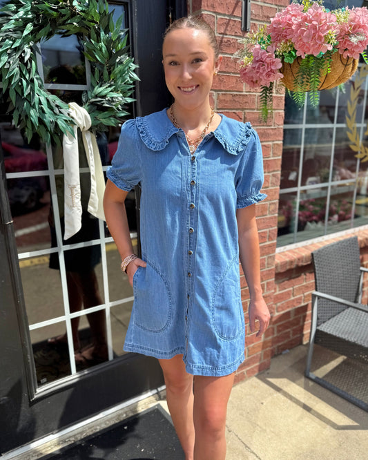 Denim Ruffle Collar Mini Dress featuring a ruffled collar and mini length; available in sizes XS-XL.