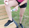 Relief Roll On is applied to a lower leg for muscle pain relief; available in 2oz and 4oz sizes.