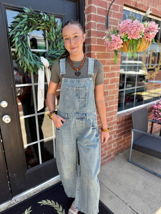 Dakota Mineral Wash Denim Jumpsuit, available in sizes S-XL.