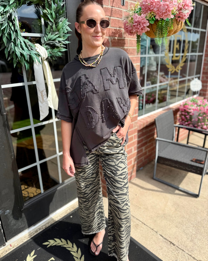 Zebra Print Wide-Leg Jean available in sizes XS–XL.