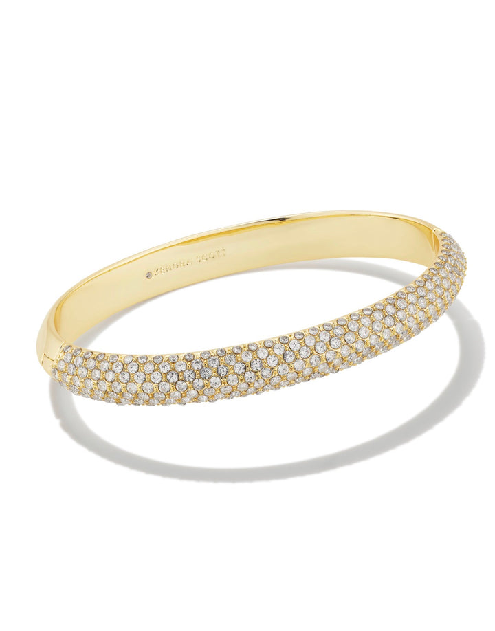 Mini Elton Luxe Cuff by Kendra Scott with multiple rows of white cubic zirconia on a gold surface; available in one size.