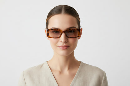 Spotted Print Sunglasses from Simply Southern with UV protection. Available in sizes S, M, L.