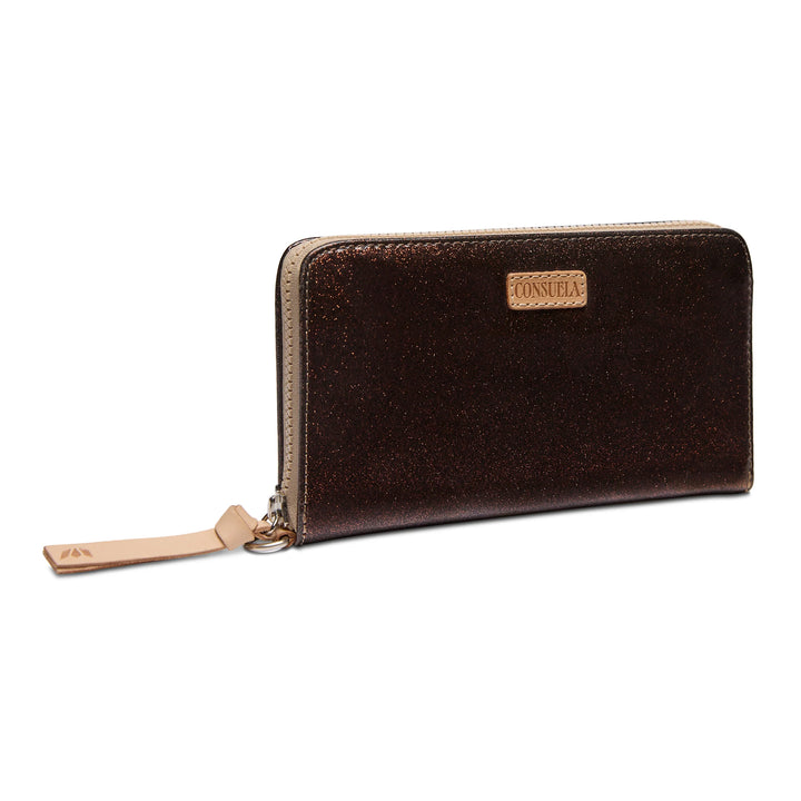 Rectangular dark brown glitter wallet with beige zipper, leather pull tab, tan "Consuela" label. Sizes: S, M, L.