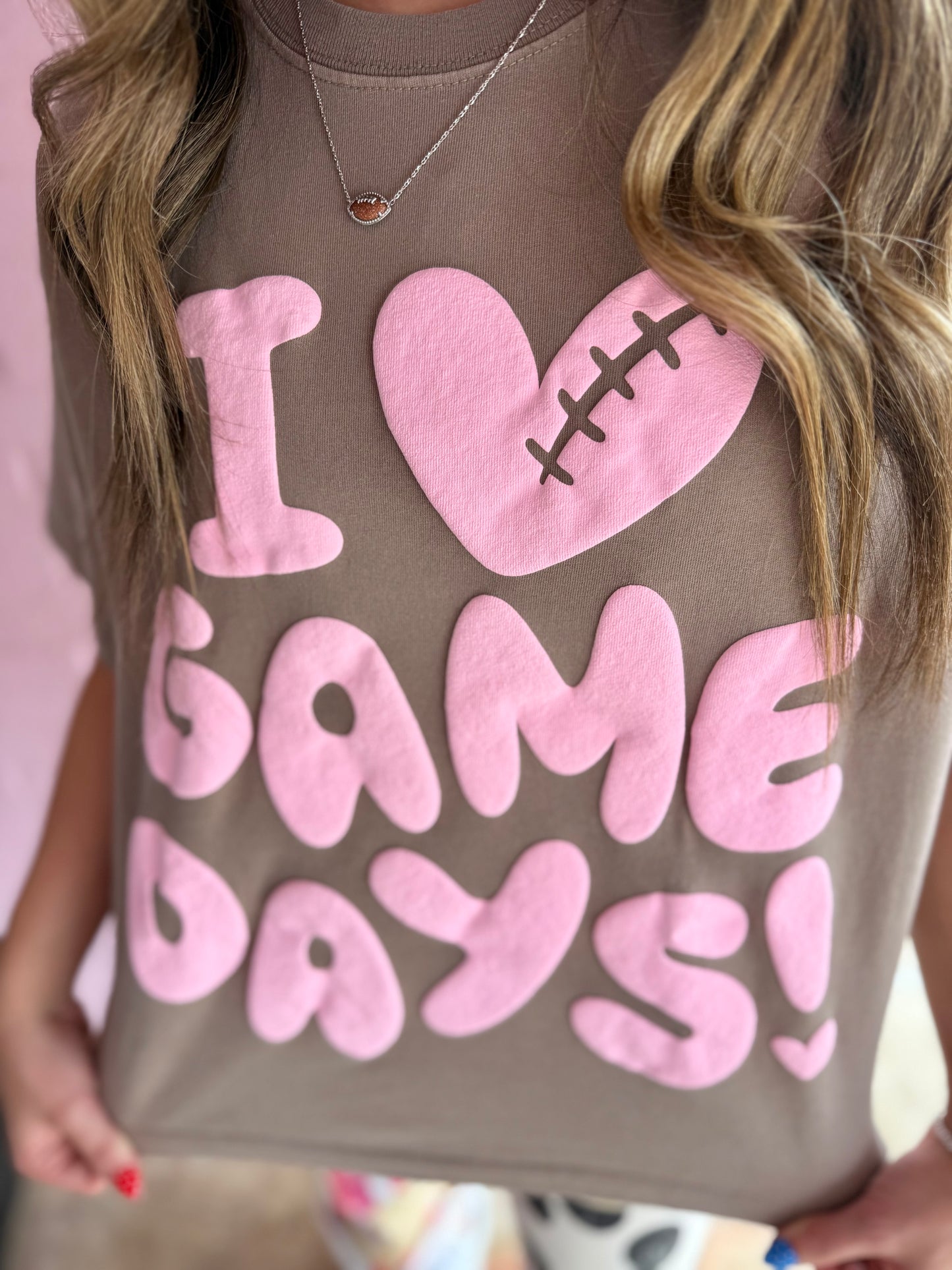 Cropped I Heart Game Day Tee with large pink "I ♥ GAME DAYS!" text and football heart. Available in sizes S-XL.