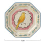 Octagon ceramic plate with yellow bird, pink cloud-like border, leaf and line details; 8.25-inch size available.