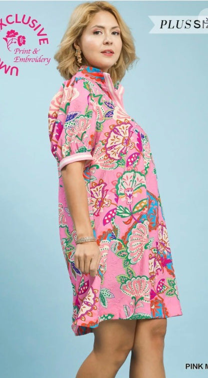 Jacquard Paisley Print Tunic Dress: short-sleeved mini dress with vibrant paisley patterns and white trim on sleeves and collar. Available in sizes XS–XL.