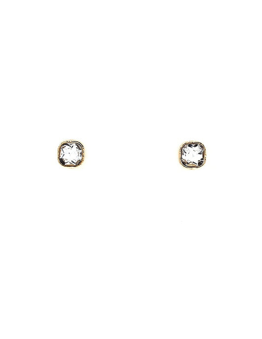 Small, square-cut clear crystal stud earrings set in gold. Meghan Browne’s Riot Gold Clear Earrings. Sizes: small only.