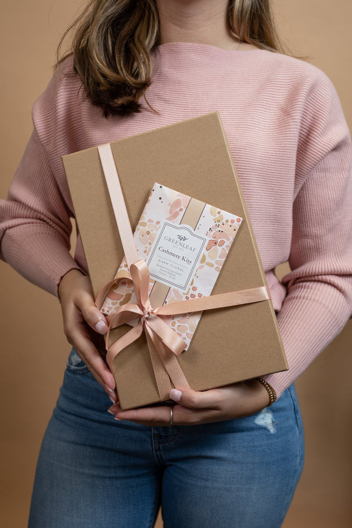 Large brown gift box with pink ribbon, bow, and card for gifting Cashmere Kiss Sachet. Available in small and large sizes.