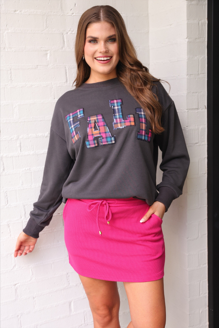 Fall Plaid Patch Pullover with colorful plaid letters spelling “FALL,” available in sizes S-XL.