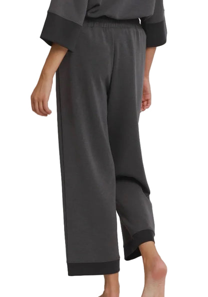 Charcoal Colorblock Straight Pants in dark gray with black ankle cuffs, loose fit. Available in sizes XS-XL.