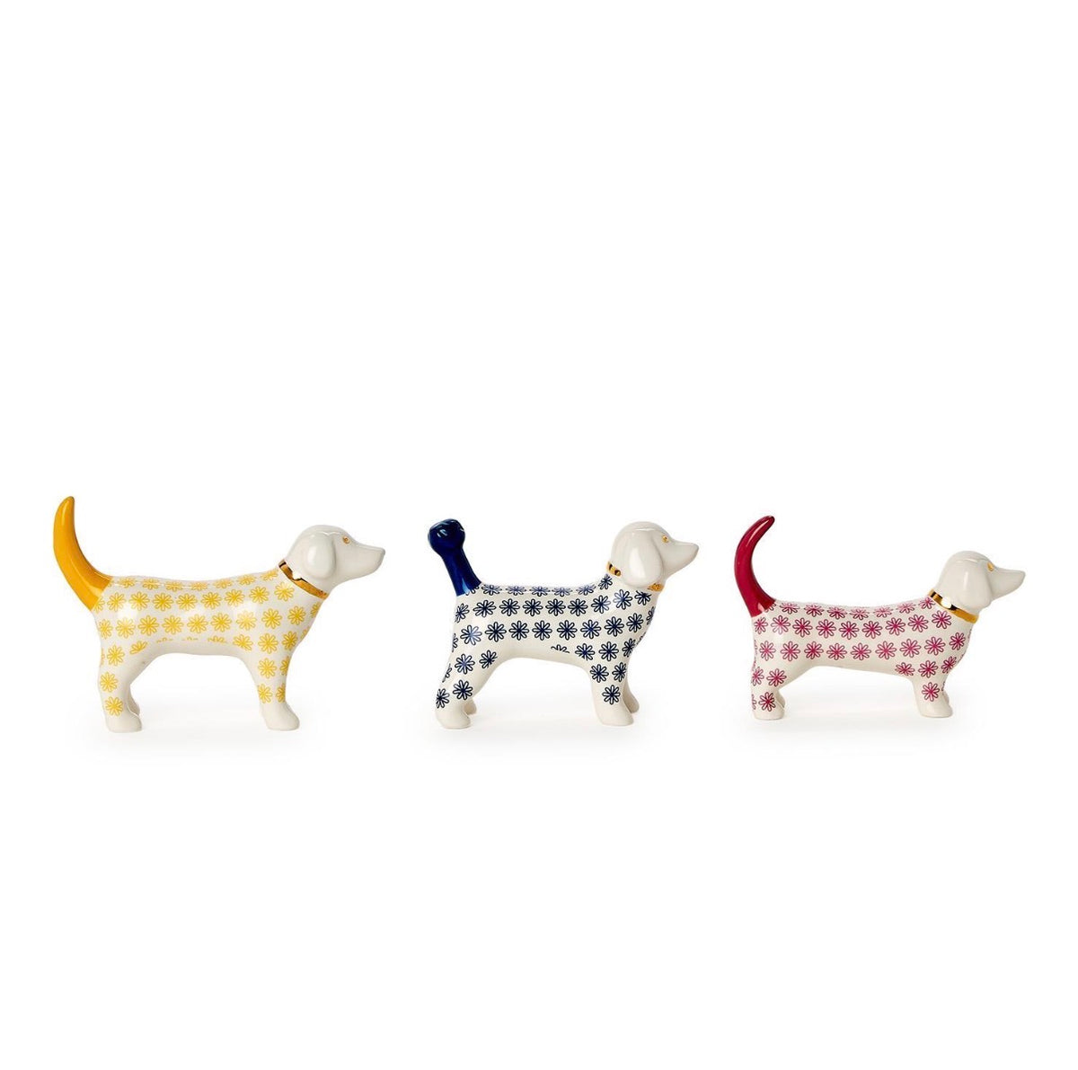 Three Posh Pooch Dog Ceramic Ring Holders in yellow, blue, and red with white heads and legs, each featuring a floral-patterned body and tail. Available in small, medium, and large sizes.