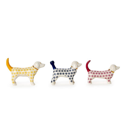 Three Posh Pooch Dog Ceramic Ring Holders in yellow, blue, and red with white heads and legs, each featuring a floral-patterned body and tail. Available in small, medium, and large sizes.